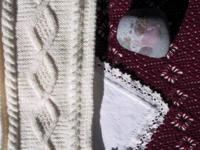 Aran scarf, crocheted table cover, place mat & pudding stone
